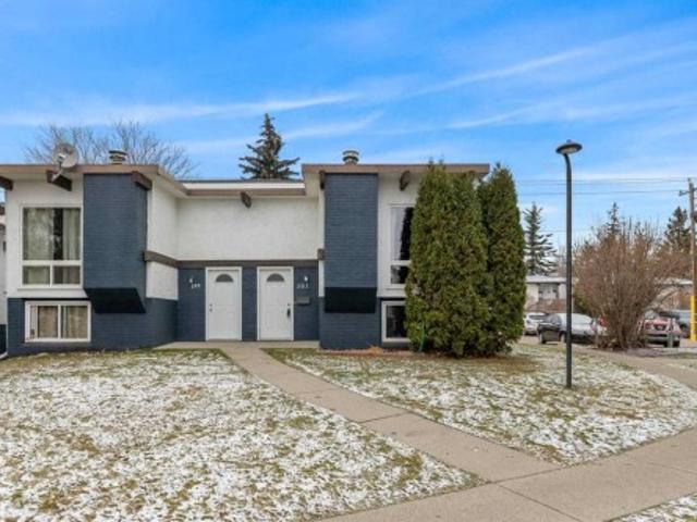 Townhouse for sale in Pineridge, Calgary