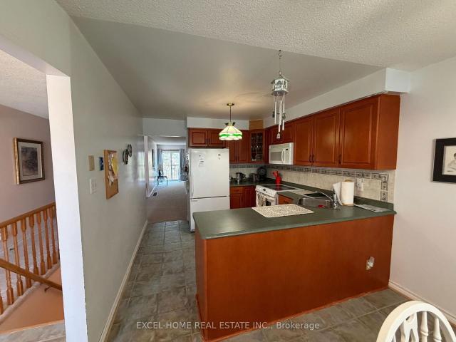 Condo for sale in Woburn, Ontario