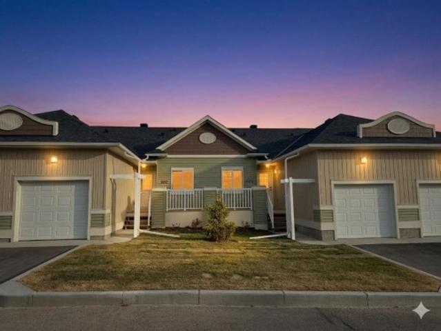 Townhouse for sale in Carstairs, Alberta