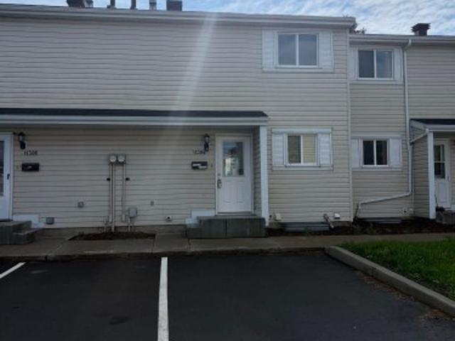 Townhouse for sale in Wedgewood, Alberta