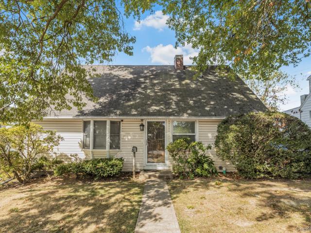 House for sale in Glenwood, New York