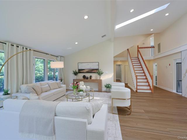 House for sale in Strathmore Village, Roslyn Heights