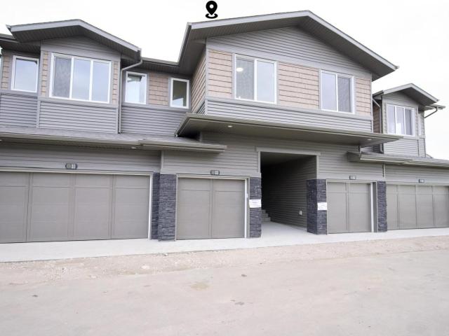 Townhouse for sale in Wedgewood, Alberta