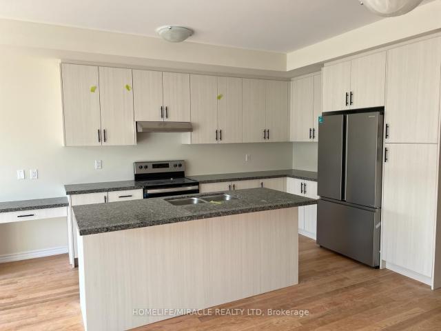 Townhouse for sale in Woburn, Ontario