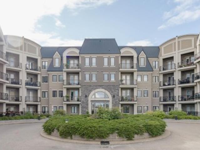 Condo for sale in Wedgewood, Alberta