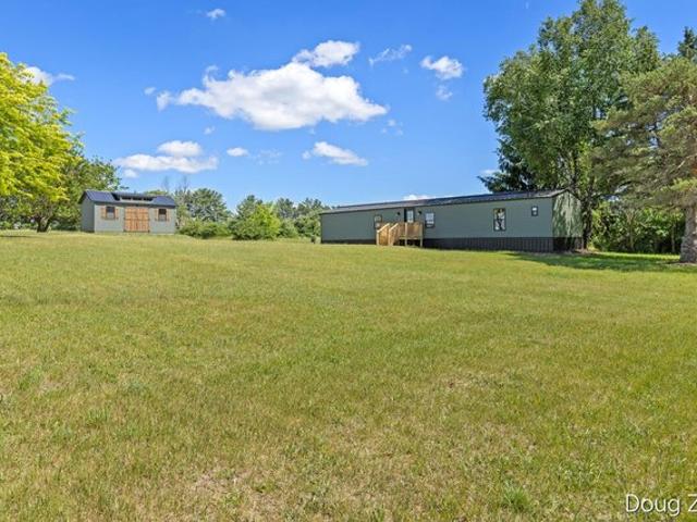 House for sale in Six Lakes, Michigan