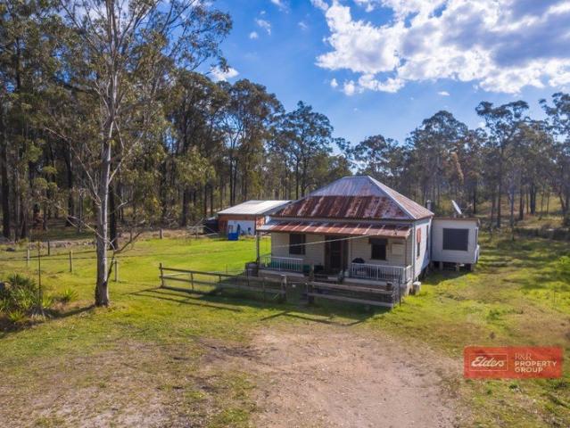 Cottage for sale in Limeburners Creek, New South Wales