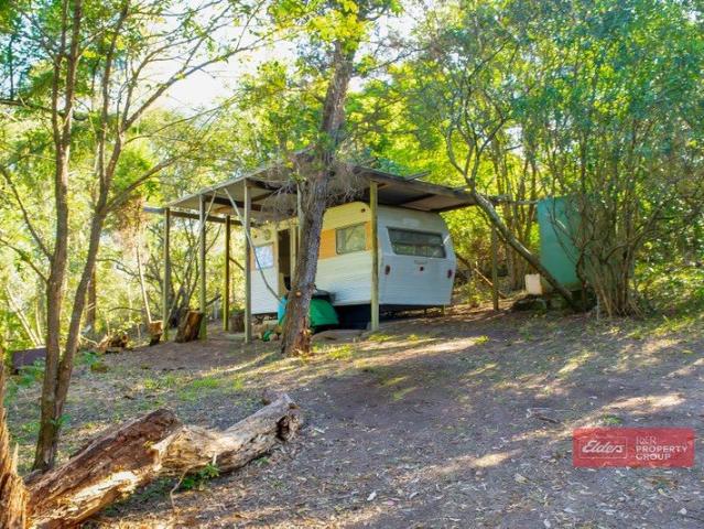 Cottage for sale in Limeburners Creek, New South Wales