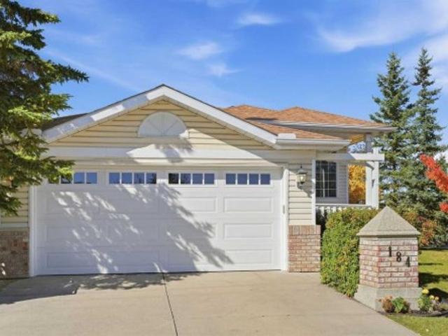 House for sale in Arbour Lake, Calgary
