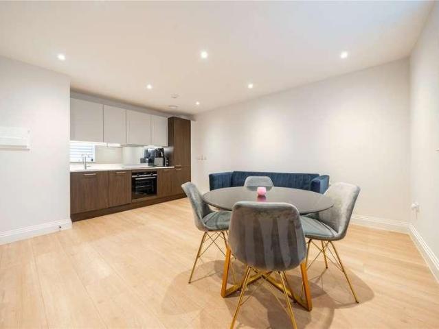 Flat for sale in Row Town, Surrey