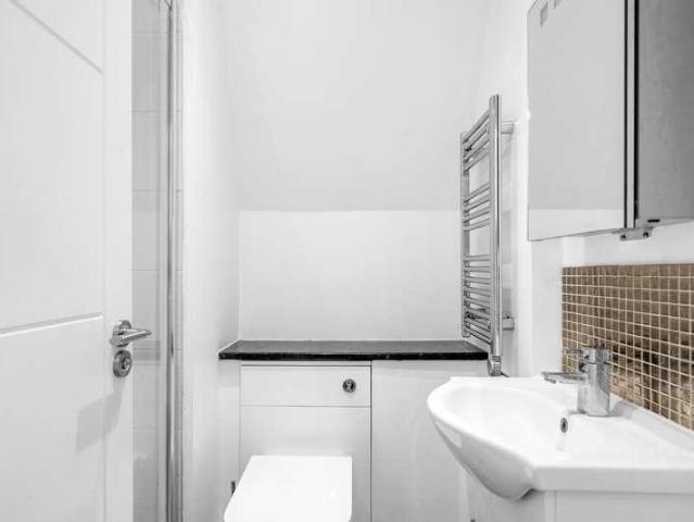 Flat for sale in Row Town, Surrey