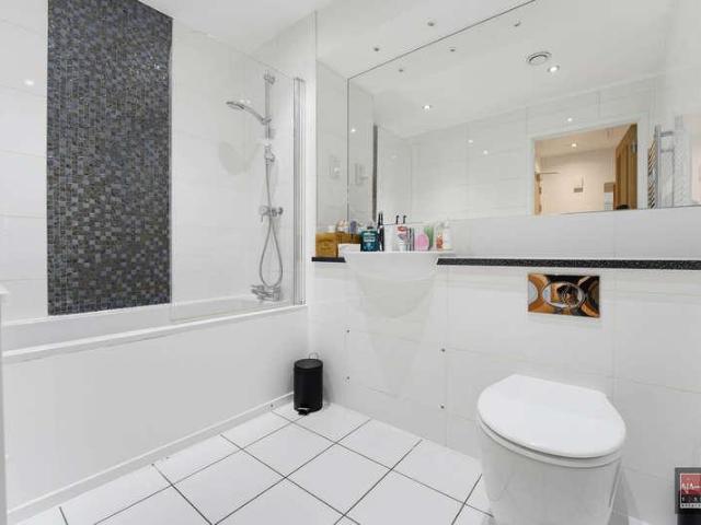 Flat for sale in Row Town, Surrey
