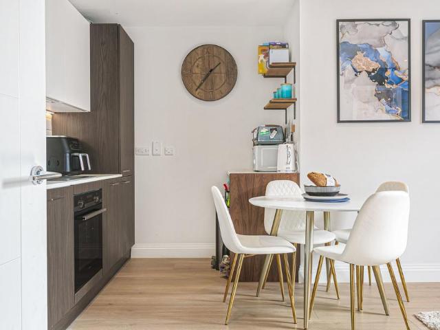 Flat for sale in Row Town, Surrey