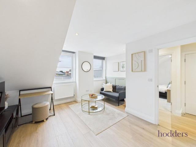 Flat for sale in Row Town, Surrey