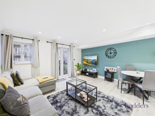 Flat for sale in Row Town, Surrey