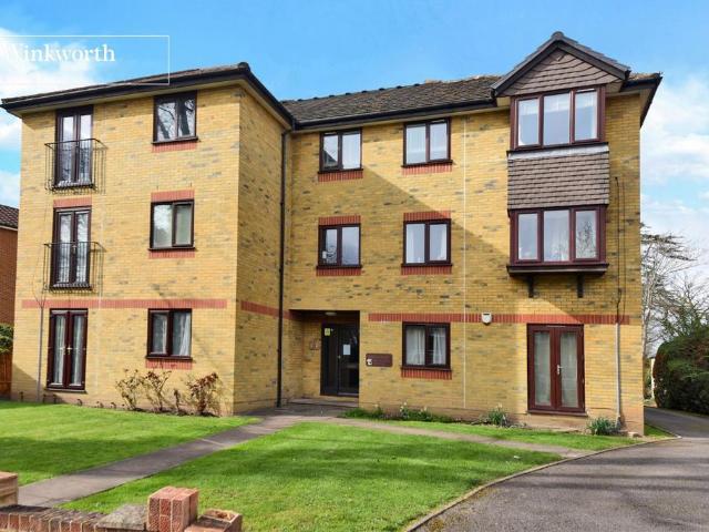 Flat for sale in Cuddington, Surrey