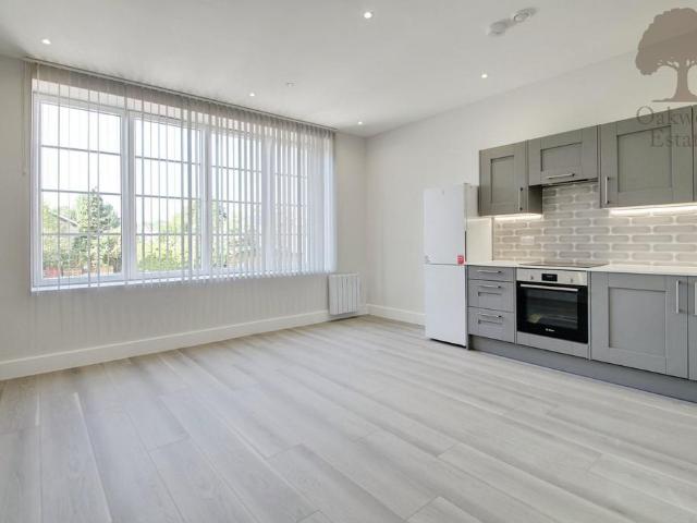 Flat for rent in Row Town, Surrey