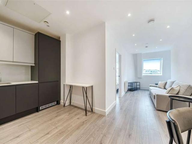 Flat for sale in Row Town, Surrey