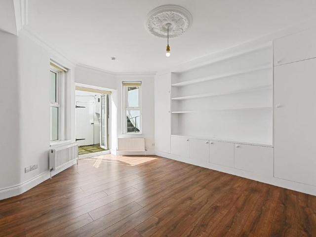 Flat for sale in Brook Green, Greater London