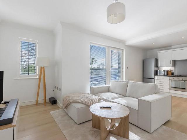 Flat for sale in Row Town, Surrey