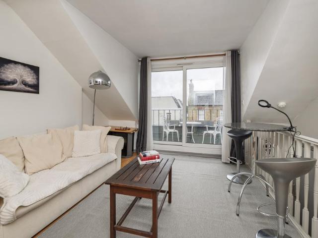 Flat for sale in Brook Green, Greater London