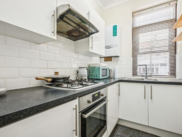 Flat for sale in Brook Green, Greater London