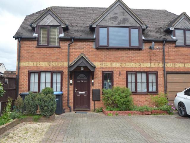 Flat for sale in Row Town, Surrey