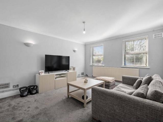 Flat for sale in Row Town, Surrey