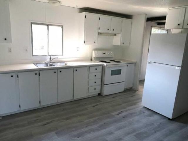 House for sale in Lousana, Alberta