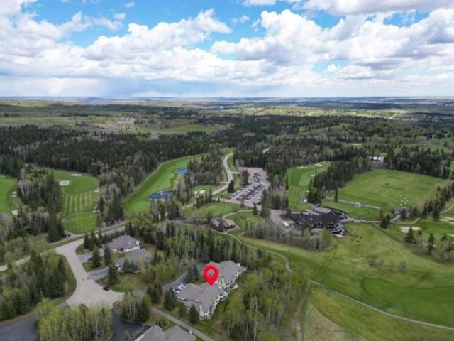 House for sale in Priddis Greens, Alberta