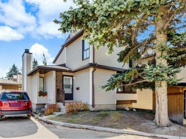 Townhouse for sale in Cedargate Village, Calgary