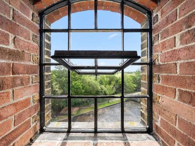 Flat for sale in Row Town, Surrey