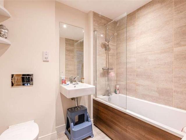 Flat for sale in Row Town, Surrey