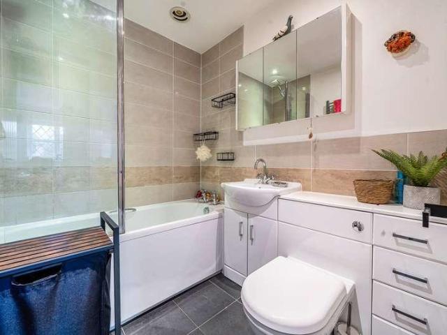 Flat for sale in Row Town, Surrey