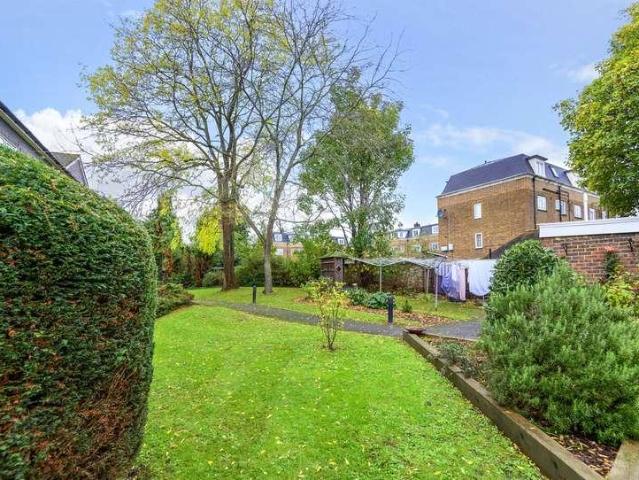 Flat for sale in Cuddington, Surrey