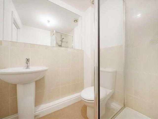 Flat for sale in Row Town, Surrey