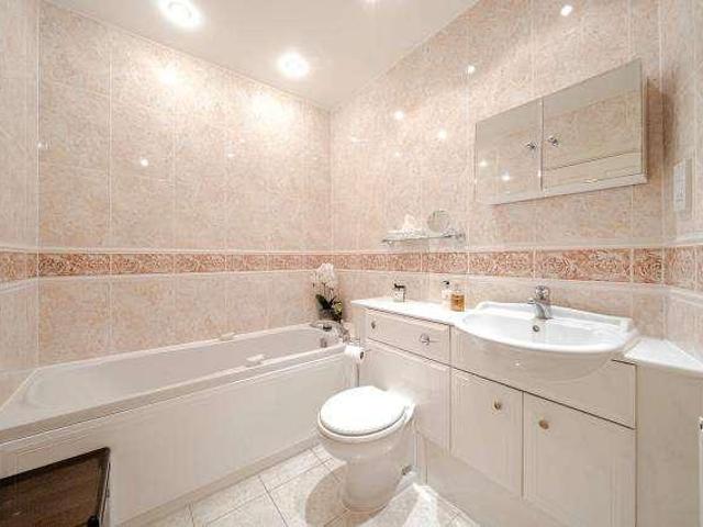 Flat for sale in Row Town, Surrey