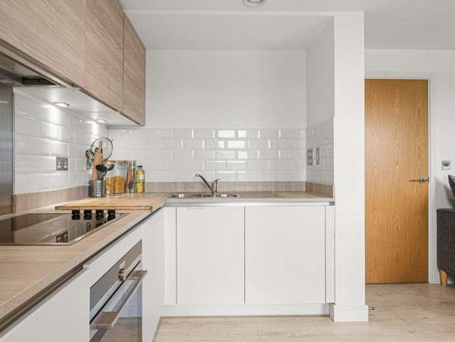 Flat for sale in Row Town, Surrey