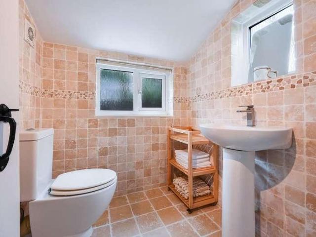House for sale in Woodcote, Epsom