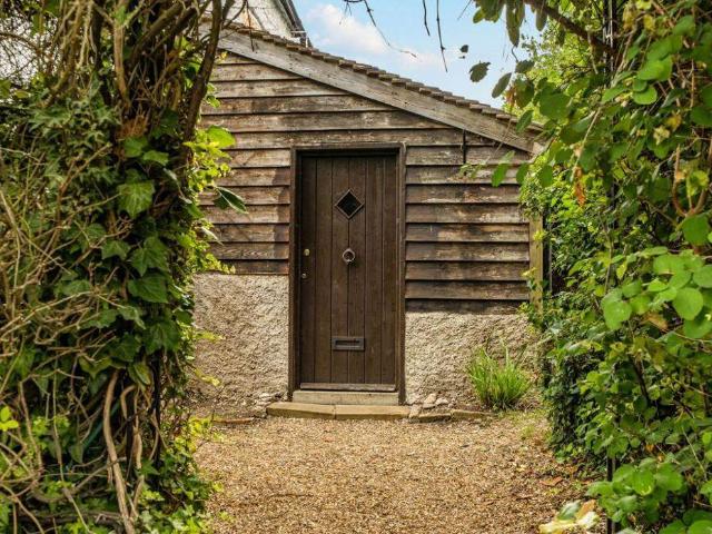 House for sale in Woodcote, Epsom