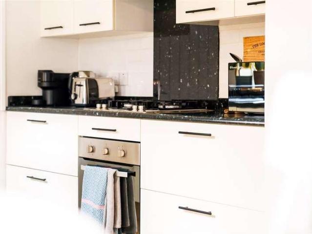 House for sale in Woodcote, Epsom
