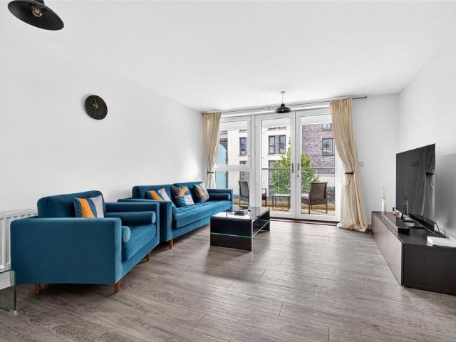 Flat for sale in Row Town, Surrey
