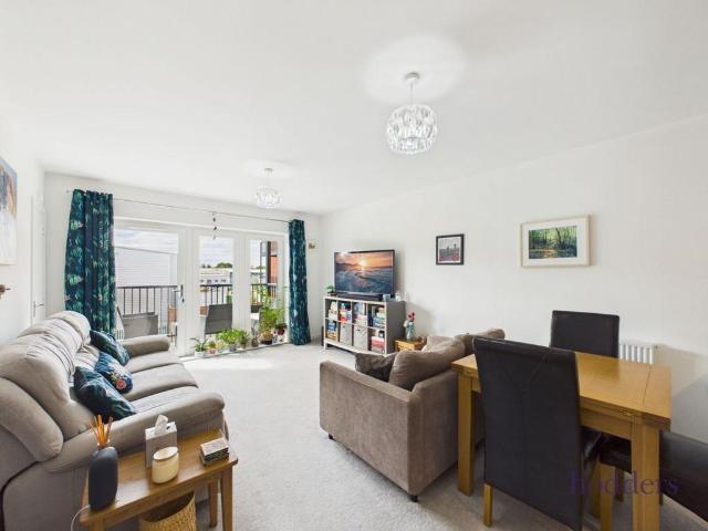 Flat for sale in Row Town, Surrey