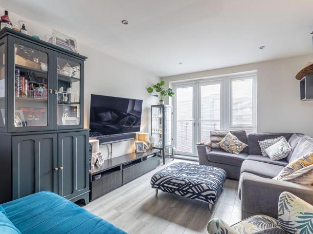 Flat for sale in Row Town, Surrey