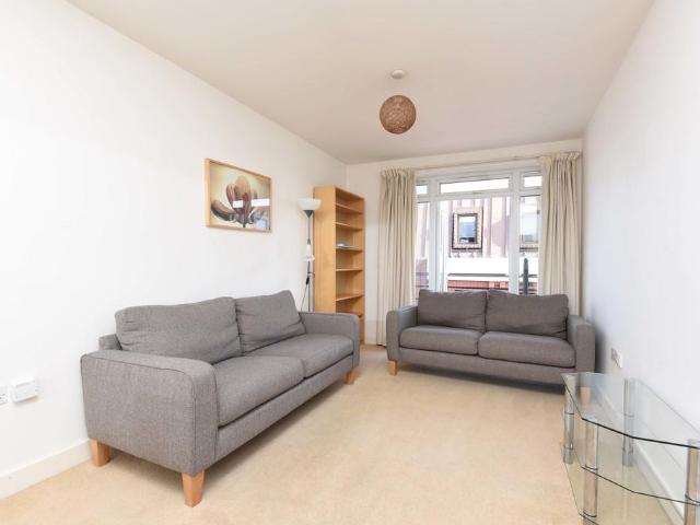Flat for sale in Row Town, Surrey