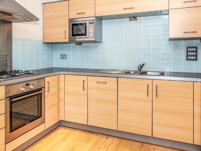 Flat for sale in Row Town, Surrey