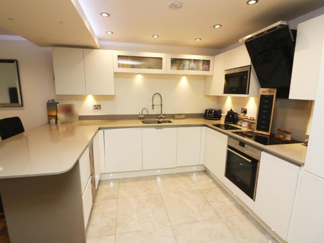 Flat for sale in Row Town, Surrey