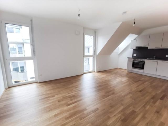 Dachgeschosswohnung kaufen in Liesing, Wien