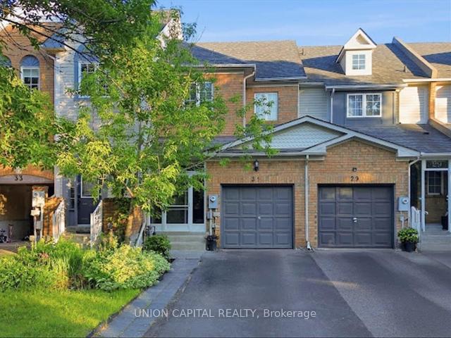 Townhouse for sale in Woburn, Ontario