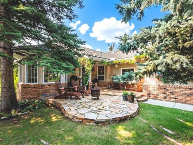 House for sale in Priddis Greens, Alberta